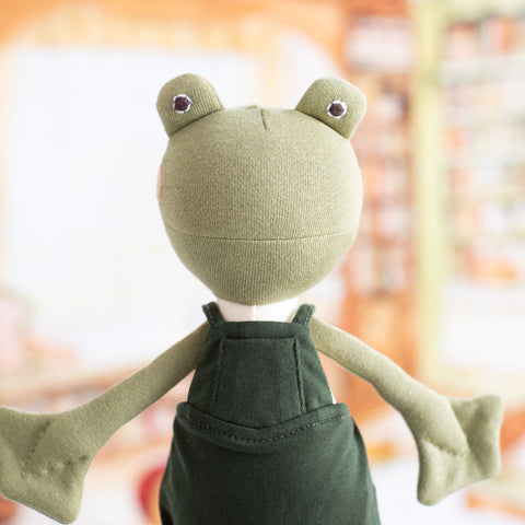 Lewis Toad is wearing the forest green picnic overalls