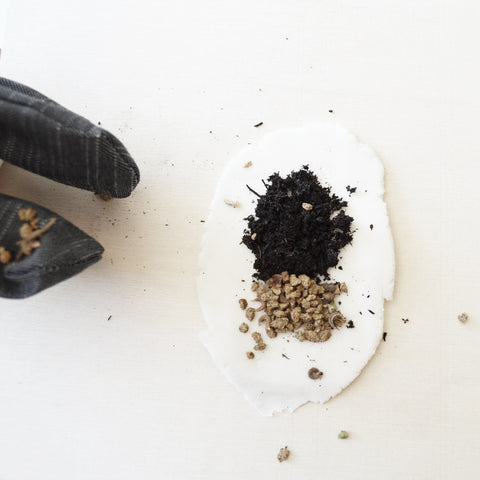 Clay, dirt, and seed mix
