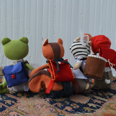 Hazel Village animals wearing doll backpacks