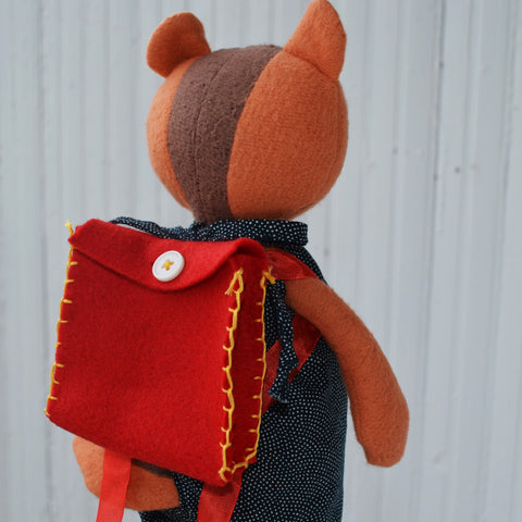 Josie Chipmunk wearing doll backpack