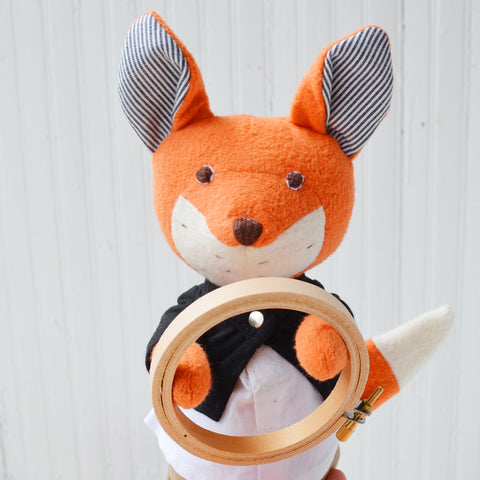 Owen Fox holding embroidery loop