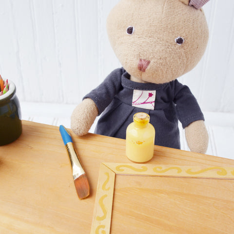 Juliette Rabbit paints doll picture frames