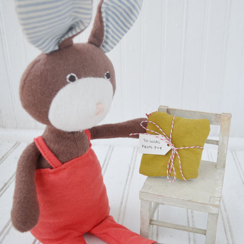 Lucas Rabbit receives his herb pillow