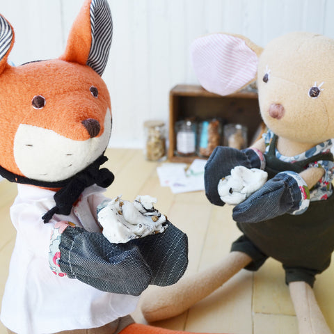 Reginald Fox and Annicke Mouse hold their seed balls
